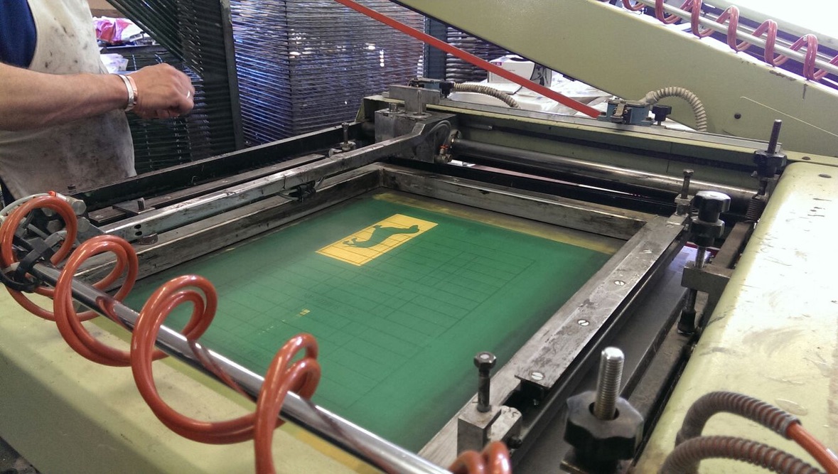 Design being printed on a press