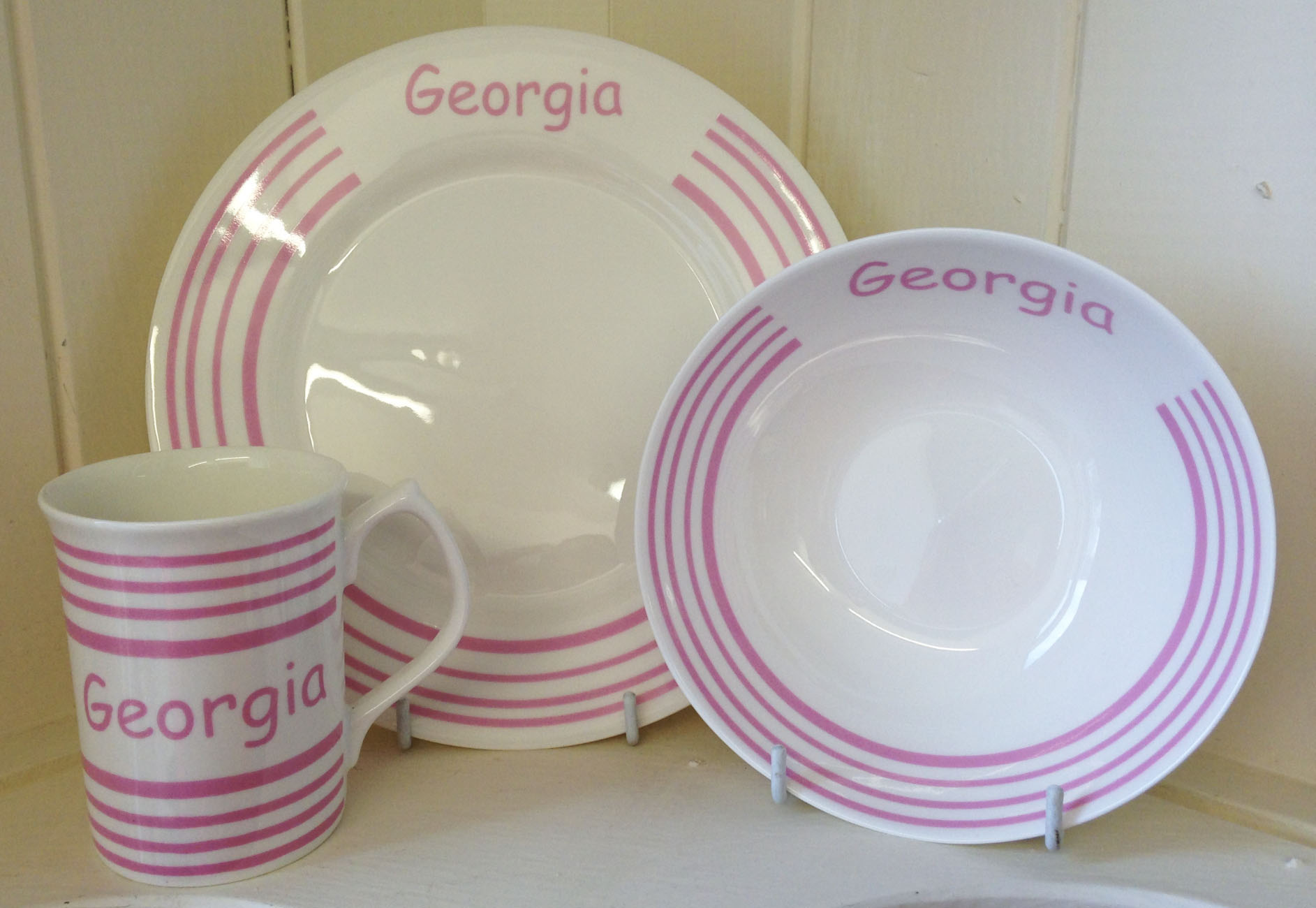 Personalised pink striped children's mug, plate and bowl