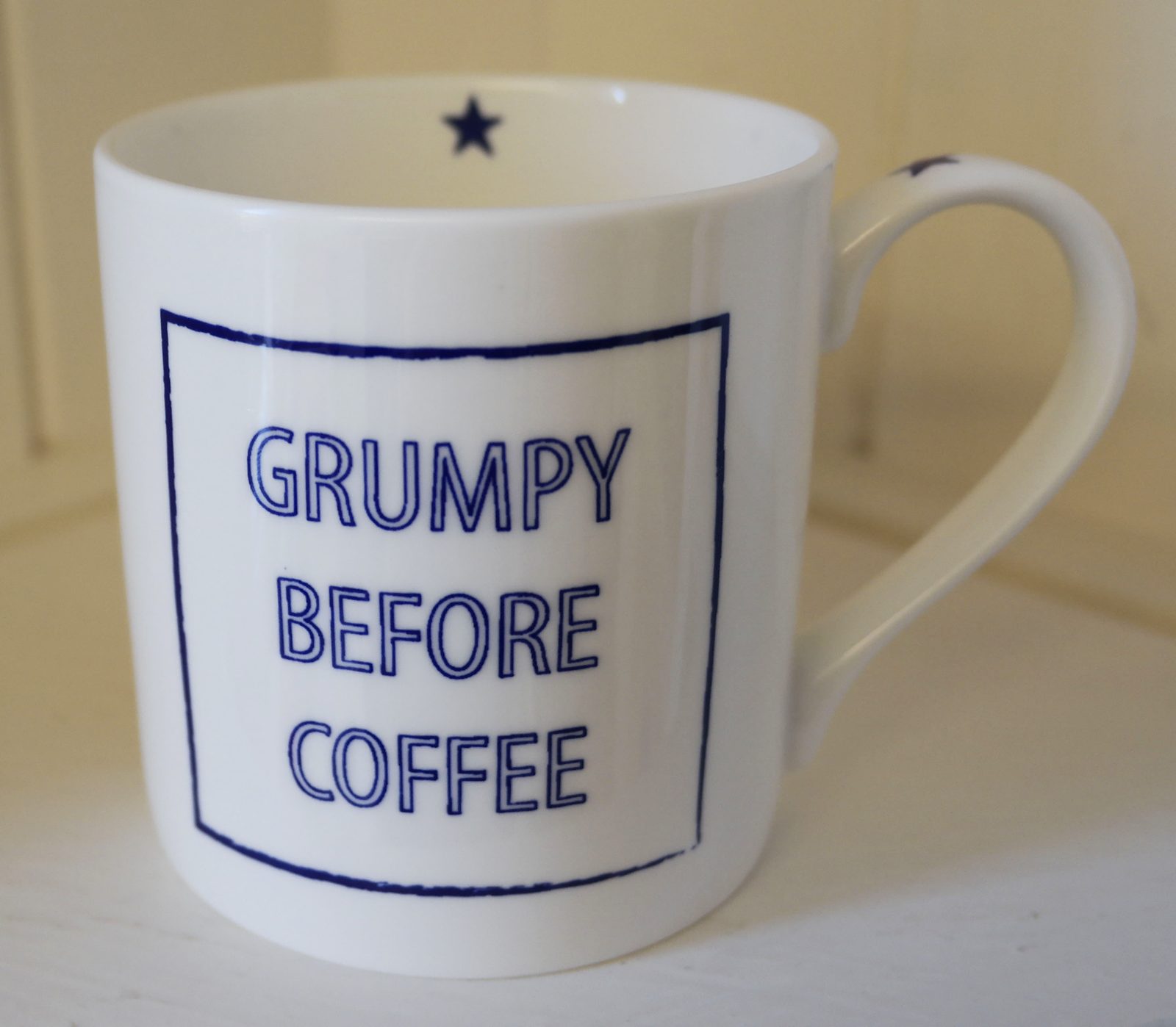 Mug printed with the slogan Grumpy before coffee