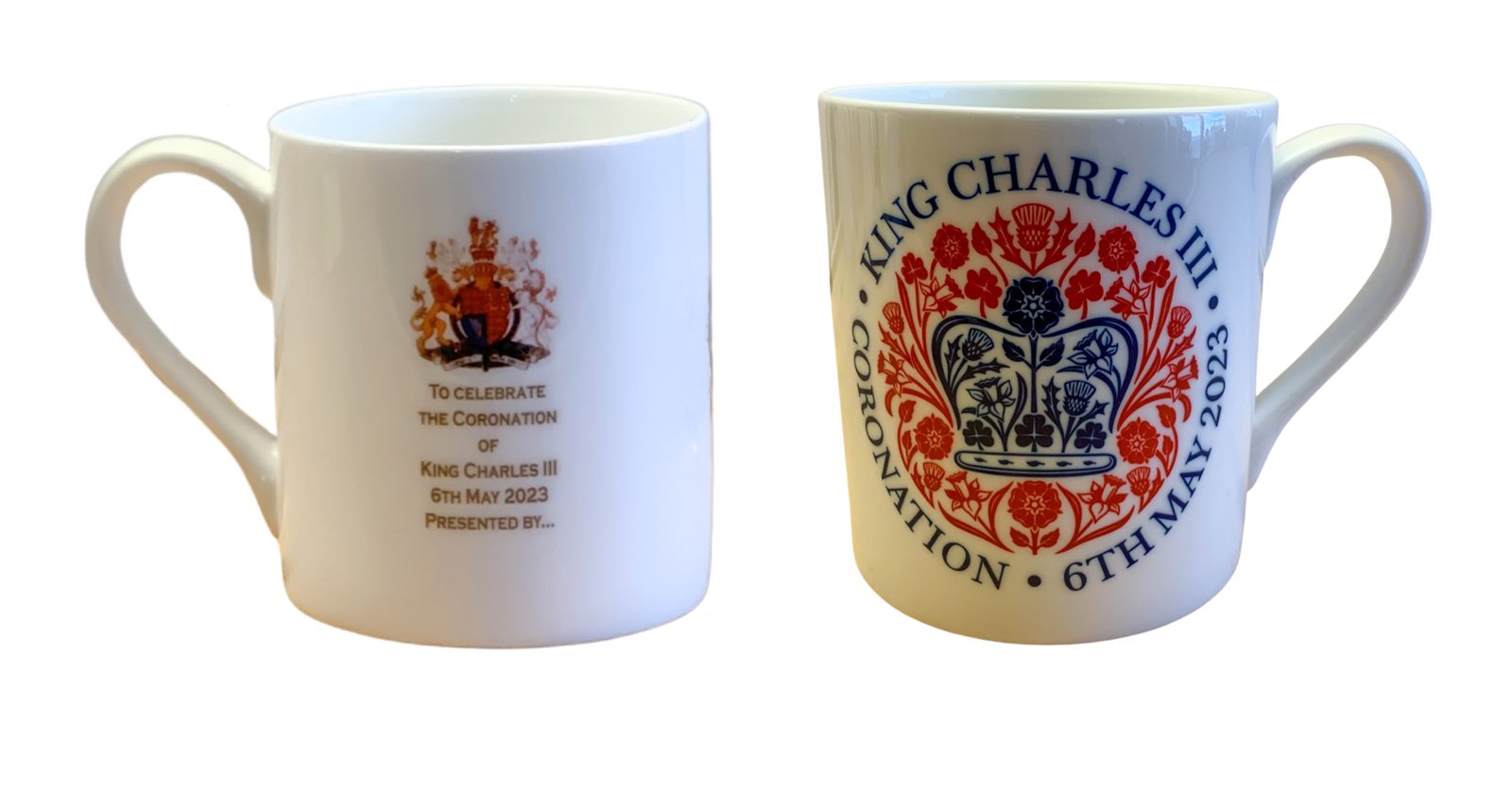King Charles III coronation mug beside a royal crest mug