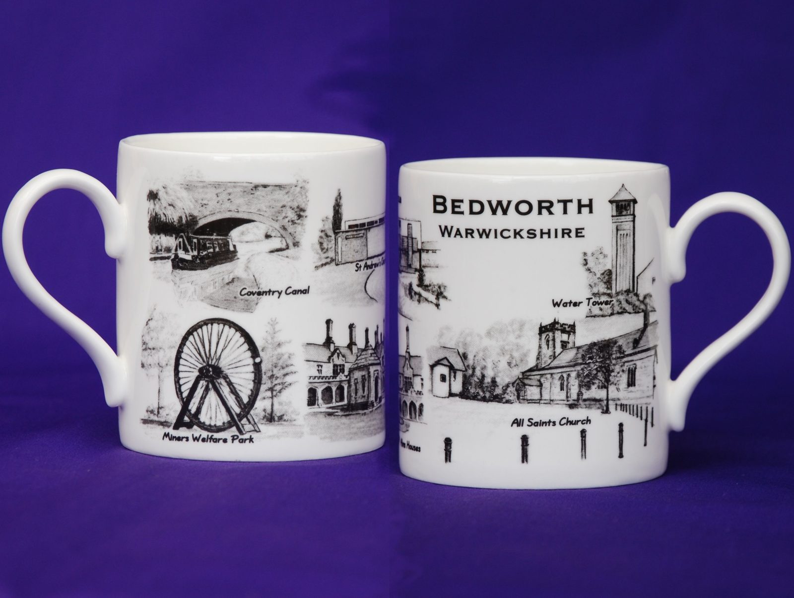 Pair of Balmoral mugs with line drawings of town landmarks